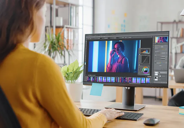 A person editing an image on a computer.