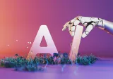 The letters 'AI' with a robotic hand holding the 'I.'